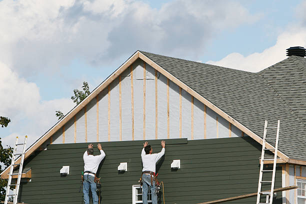 Professional Vinyl Siding technician working in Garner, NC